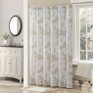 Floral tan and ivory fabric shower curtain with satin nickel hooks.